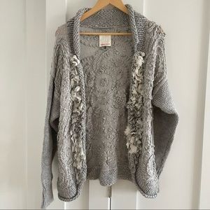 Grey crotchet loose knit cardigan with white floral embellishment